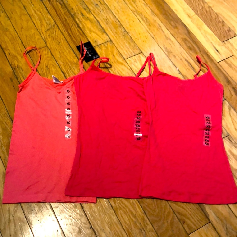 New 2 planet gold tank top and 1 energie 3 for 10.